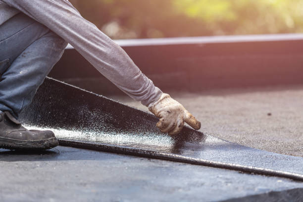 Professional Waterproofing technician working in Bay Shore, NY